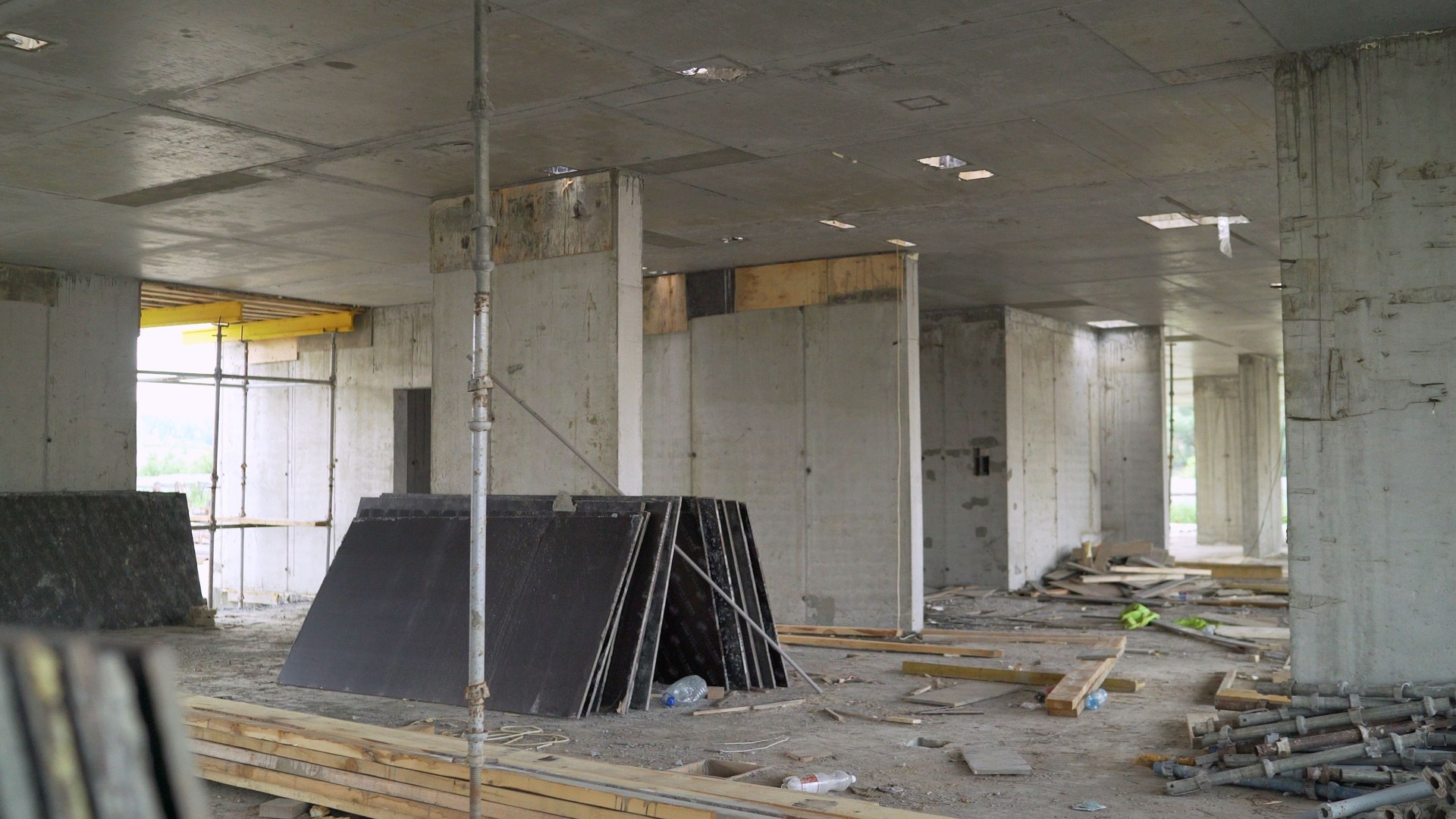 Construction site concrete structure. House building walls and slabs.